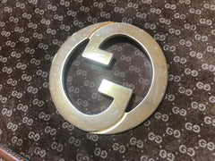 Vintage Gucci brown leather micro GG print shoulder bag with iconic golden large round GG motif. Rare masterpiece purse.