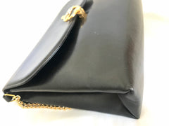 Vintage Gucci black leather shoulder bag with golden and silver tone GG logo motif. Classic purse. Can be clutch bag.