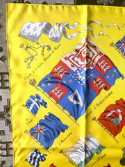 Vintage HERMES Carre large yellow silk scarf with red, blue, and white flag print. Best foulard. PAVOIS.