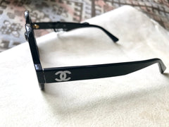 Vintage CHANEL black round frame mod sunglasses with white CHANEL PARIS logo. 060412