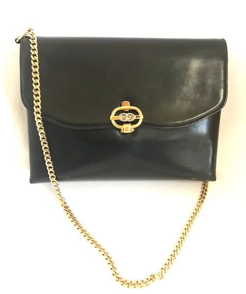 Vintage Christian Dior grained black leather handbag with oval golden –  eNdApPi ***where you can find your favorite designer  vintages..authentic, affordable, and lovable.