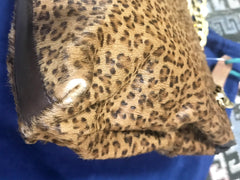 Vintage Bottega Veneta genuine leather shoulder bag with allover faux leopard print and double golden chain straps.