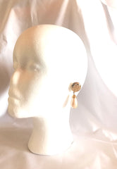 Vintage Givenchy golden round dangle earrings with teardrop faux pearl. Classic and beautiful jewelry piece.