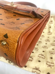 Vintage MCM classic brown monogram Kelly bag with golden logo plate. Perfect daily use bag. By Michael Cromber, Germany