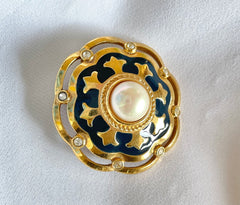 Vintage Burberry faux pearl, crystal stones, and gold and navy tone detailed design brooch. Rare Burberry masterpiece. 0503101