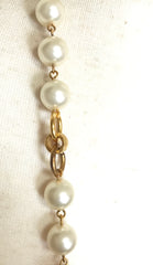 Vintage CHANEL golden chain and faux pearl long necklace with arabesque CC mark motif. Can be double or used as a belt as well.