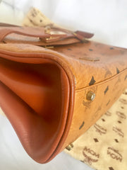 Vintage MCM classic brown monogram Kelly bag with golden logo plate. Perfect daily use bag. By Michael Cromber, Germany