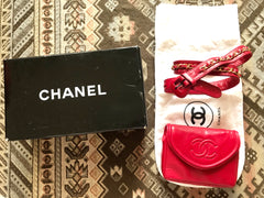 Vintage CHANEL red leather belt bag, fanny pack with detachable chain belt and CC stitch mark on flap.  Fits 29.5" through 32.8"