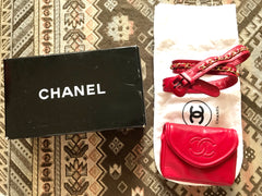 Vintage CHANEL red leather belt bag, fanny pack with detachable chain belt and CC stitch mark on flap. Fits 29.5" through 32.8"