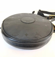 Vintage MCM black monogram round shape Suzy Wong shoulder bag with leather trimmings and fringes. Unisex. West Germany made.