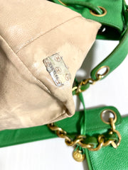 Vintage CHANEL green caviar leather hobo bucket shoulder bag with golden chain strap, drawstrings, and CC stitch mark. 041206an11