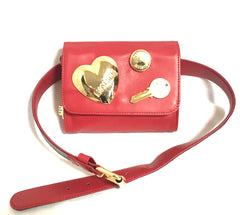 Vintage MOSCHINO red leather waist purse, fanny pack, clutch bag with large golden heart, key motifs, and can budge motif. R0410118