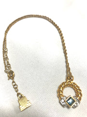 Vintage LANVIN golden skinny chain necklace with golden round pendant top. Clear crystals and green glass stone. Perfect jewelry gift.