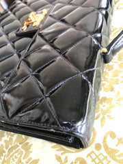 1990s. Vintage CHANEL black patent enamel briefcase business bag with golden large CC motif. Classic and traditional masterpiece you must have.