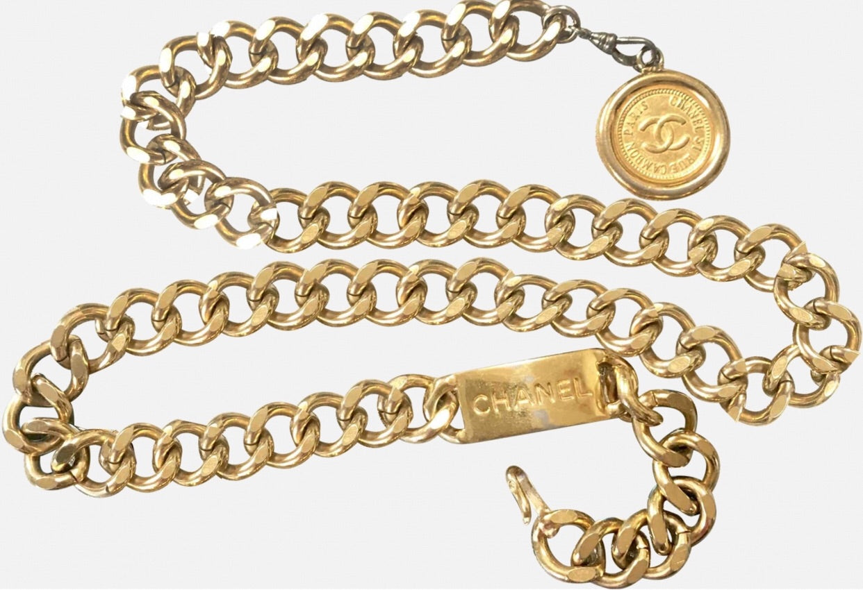 1980s-1990s. Vintage CHANEL golden thick chain belt with a golden CC charm and logo plate. 83cm at max