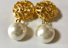 Vintage Salvatore Ferragamo white faux pearl dangle earrings with golden shoe design featured charm. Gorgesous jewelry.