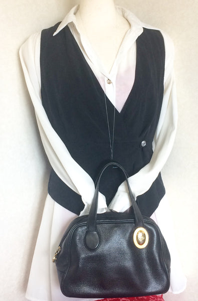 Vintage Christian Dior black grained leather mini bolide style handbag –  eNdApPi ***where you can find your favorite designer  vintages..authentic, affordable, and lovable.