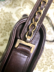 80's vintage Chanel dark brown quilted lambskin shoulder bag with CC motif and built-in chain shoulder strap. Rare Chanel purse