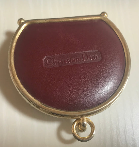 Vintage Christian Dior Vintage wine brown coin case with kiss lock closure.  Cute round shape. Made in Spain