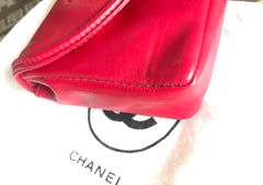Vintage CHANEL red leather belt bag, fanny pack with detachable chain belt and CC stitch mark on flap. Fits 29.5" through 32.8"