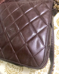 80's vintage Chanel dark brown quilted lambskin shoulder bag with CC motif and built-in chain shoulder strap. Rare Chanel purse