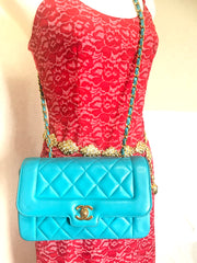 Vintage CHANEL emerald blue 2.55 chain shoulder bag with golden CC closure. Rare color purse. Must have collectible piece.