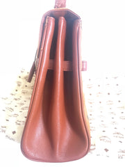 Vintage MCM classic brown monogram Kelly bag with golden logo plate. Perfect daily use bag. By Michael Cromber, Germany