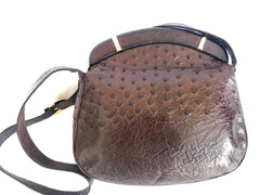 Vintage GUCCI dark brown genuine ostrich leather fisherman bag style shoulder bag with logo embossed motif. Rare masterpiece.