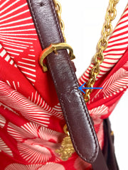Vintage Cartier kelly style wine leather shoulder bag with a decorative built-in belt. les must de cartier collection.