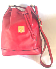 Vintage Celine red leather hobo bucket shoulder bag with a golden square logo motif and matching pouch. Classic drawstrings purse.