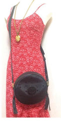 Vintage MCM black monogram round shape Suzy Wong shoulder bag with leather trimmings and fringes. Unisex. West Germany made.