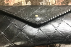 1980s. Vintage CHANEL black goatskin bill, card, checkbook long wallet pouch purse with mini CC motif. Classic unisex style.