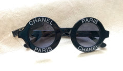 Vintage CHANEL black round frame mod sunglasses with white CHANEL PARIS logo. 060412