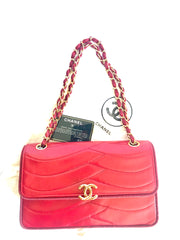 Vintage Chanel red 2.55 shoulder bag with wavy stitches and rope strings and gold chain strap. Very rare piece from the era. 050316r4