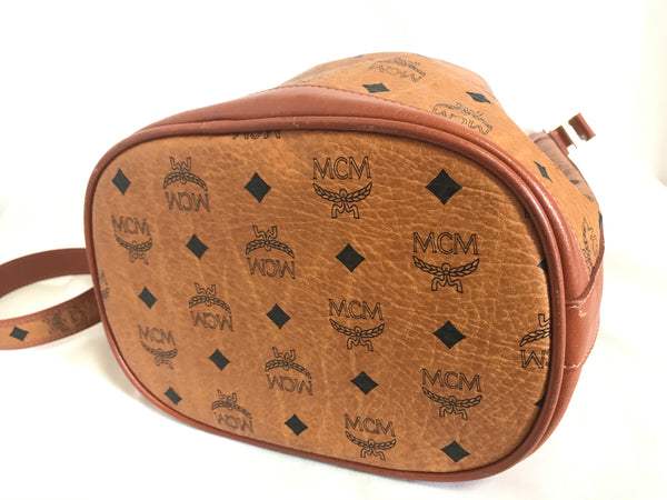 Vintage MCM brown monogram hobo bucket shoulder bag. Designed by
