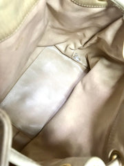 Vintage CHANEL beige quilted lamb leather hobo bucket shoulder bag with drawstrings and golden CC mark ball. 050320r3