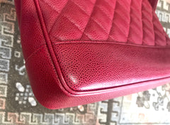 Vintage CHANEL cherry red caviar leather quilted shoulder bag, tote with golden CC ball and chain straps. Classic bag.