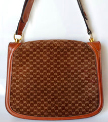 Vintage Gucci brown leather micro GG print shoulder bag with iconic golden large round GG motif. Rare masterpiece purse.