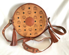 Vintage MCM brown monogram round Suzy Wong shoulder bag with brown leather trimmings. Designed by Michael Cromer. Classic masterpiece bag.
