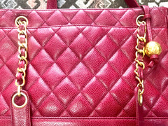Vintage CHANEL cherry red caviar leather quilted shoulder bag, tote with golden CC ball and chain straps. Classic bag.