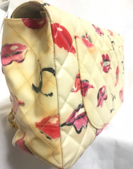 Vintage CHANEL cream vinyl coated canvas 2.55 jumbo chain shoulder bag with CC mark and lip illustration print. Rare masterpiece.