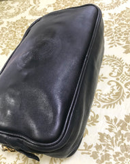 Vintage Gianni Versace black leather purse pouch, case bag with its iconic medusa face and golden logo motif charm. Unisex bag. 061122re1