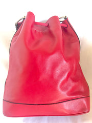 Vintage Celine red leather hobo bucket shoulder bag with a golden square logo motif and matching pouch. Classic drawstrings purse.