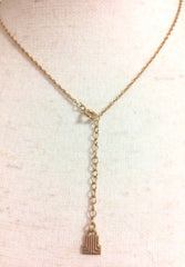 Vintage LANVIN golden skinny chain necklace with heart logo charm pendant top with clear crystals and blue crystal. 05063010