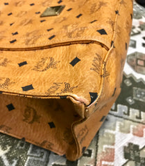 Vintage MCM brown monogram large tote bag with long straps. Classic style for unisex use. By Michael Cromer.