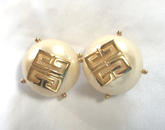 Vintage Givenchy extra large round pearl earrings with logo mark. Gorgeous jewelry piece.