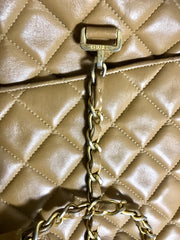 80's Vintage CHANEL brown lambskin large classic bag with double golden chain strap and a CC pull charm.