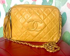 Ves Vintage Chanel yellow lambskin camera bag style chain shoulder bag with fringe and CC stitch mark. Good daily purse. Good fortune color.