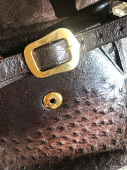 Vintage GUCCI dark brown genuine ostrich leather fisherman bag style shoulder bag with logo embossed motif. Rare masterpiece.