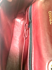 80's vintage Chanel black 2.55 shoulder bag with wavy stitches and rope strings and gold chain strap. Very rare piece from the era